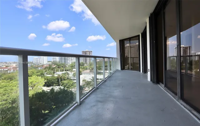 a view of hallway with a large window