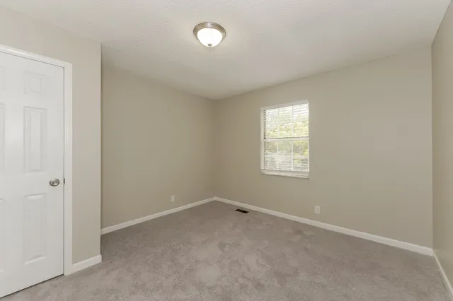 a bathroom with a sink vanity and a mirror