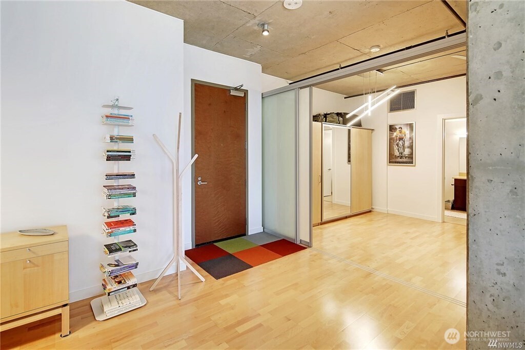 2720 3rd Avenue, Unit 909 Seattle, WA 98121 - Photo 2 of 40 a view of a room with wall and entryway