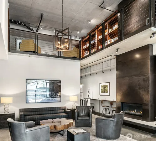 a living room with furniture and windows