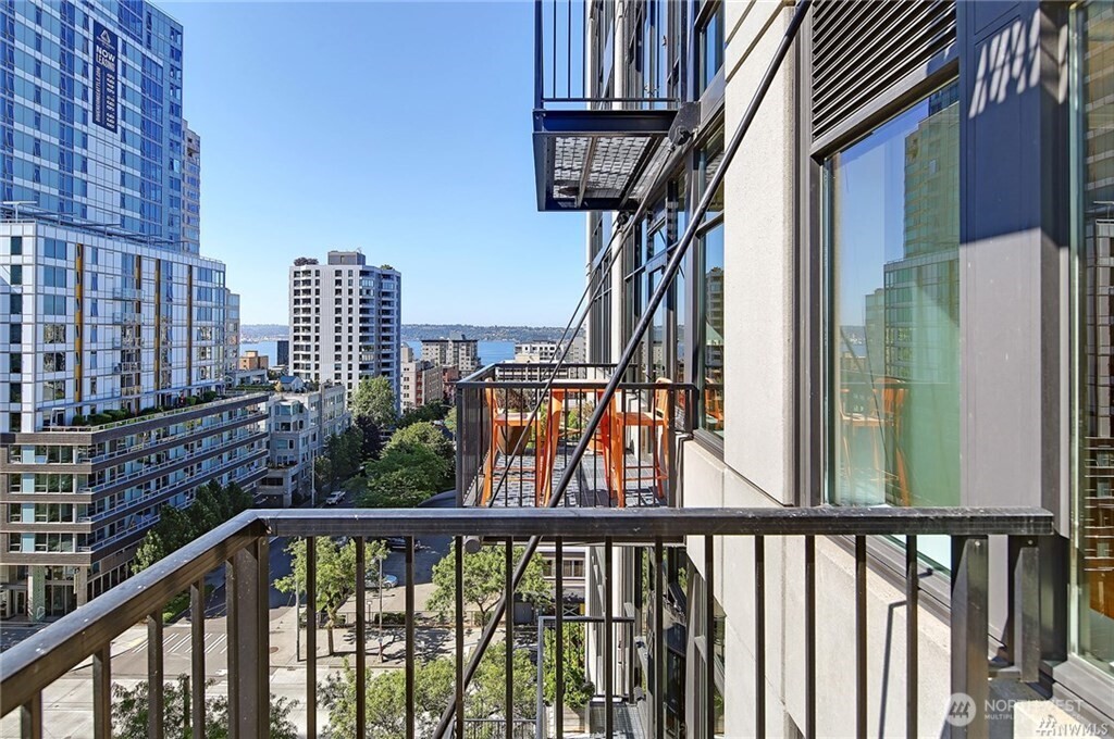 2720 3rd Avenue, Unit 909 Seattle, WA 98121 - Photo 37 of 40 a view of a balcony with an outdoor space