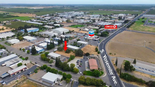an aerial view of a houses with a outdoor space