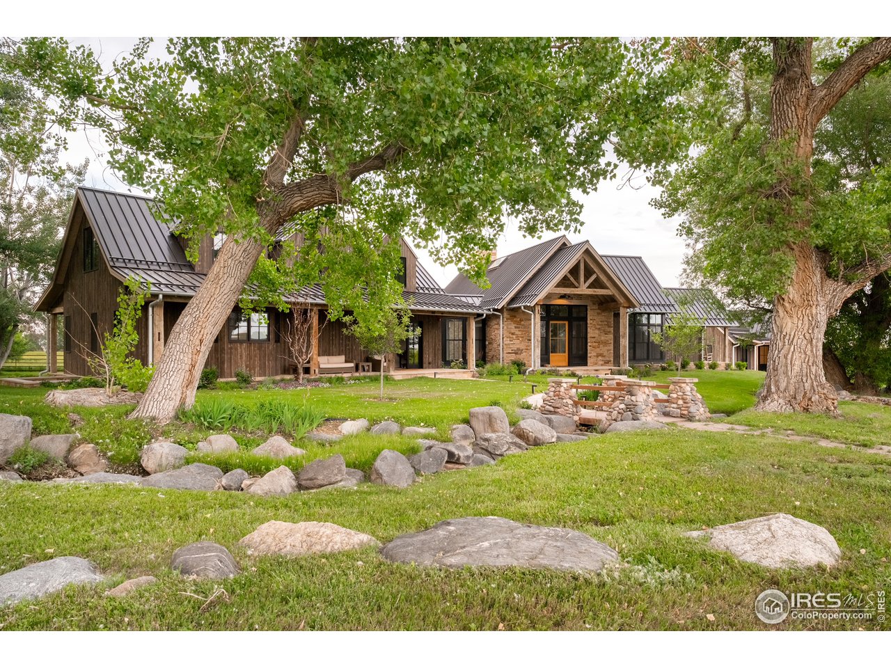 Undisclosed Address Longmont, CO 80503 - Photo 1 of 1 a front view of a house with a yard