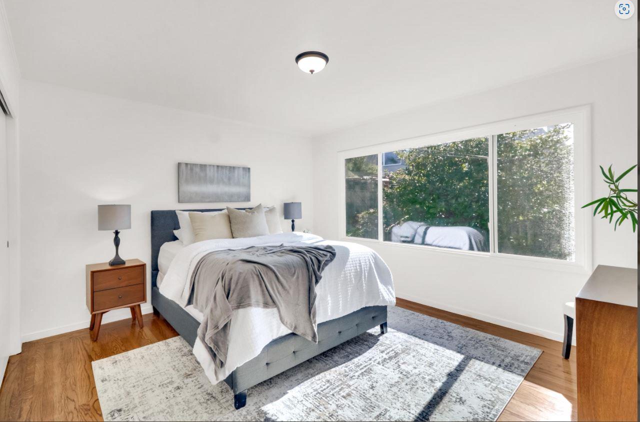 58 Pinehaven Drive Daly City, CA 94015 - Photo 20 of 38 a bed sitting in a bedroom next to a window