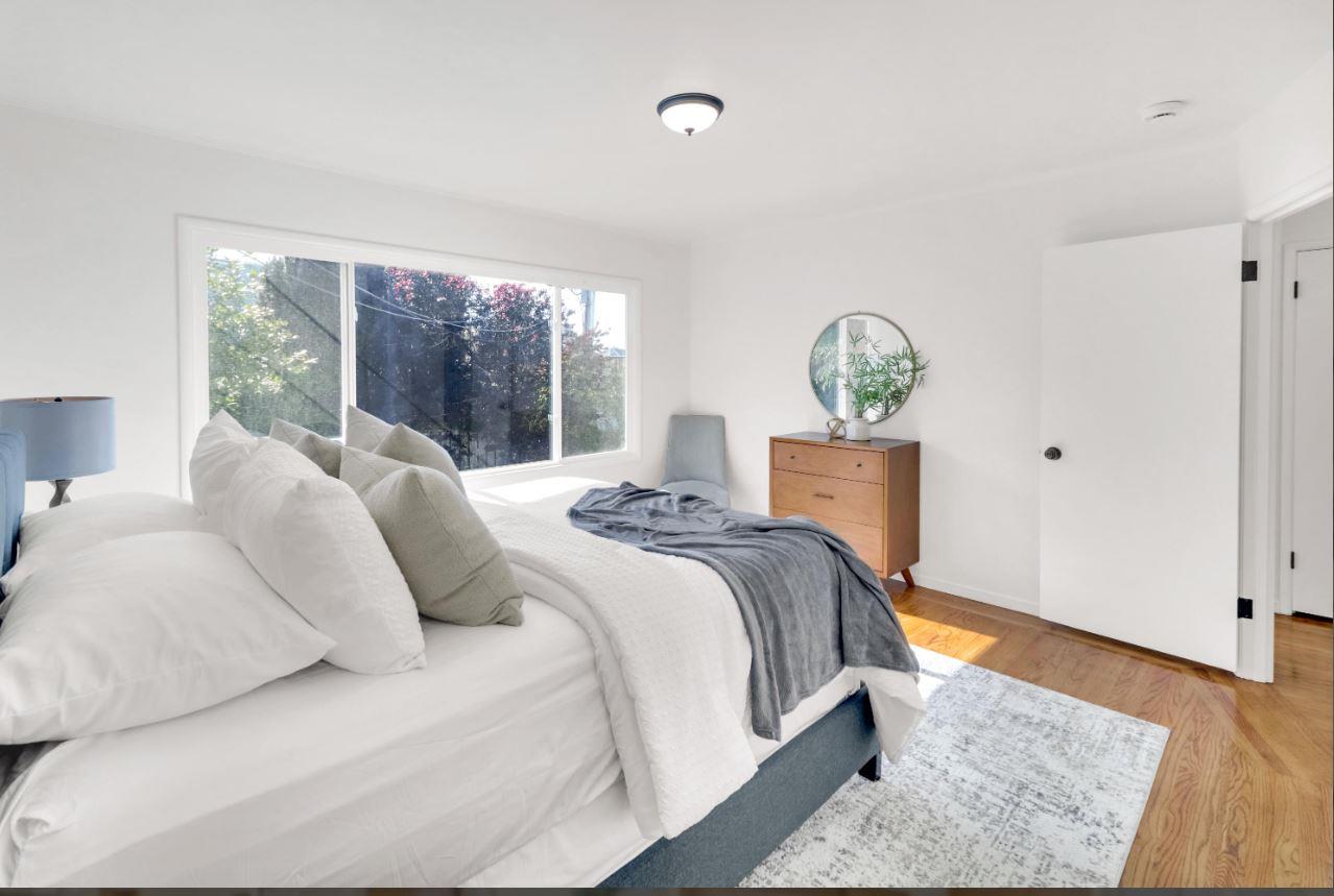 58 Pinehaven Drive Daly City, CA 94015 - Photo 22 of 38 a bedroom with a bed and window