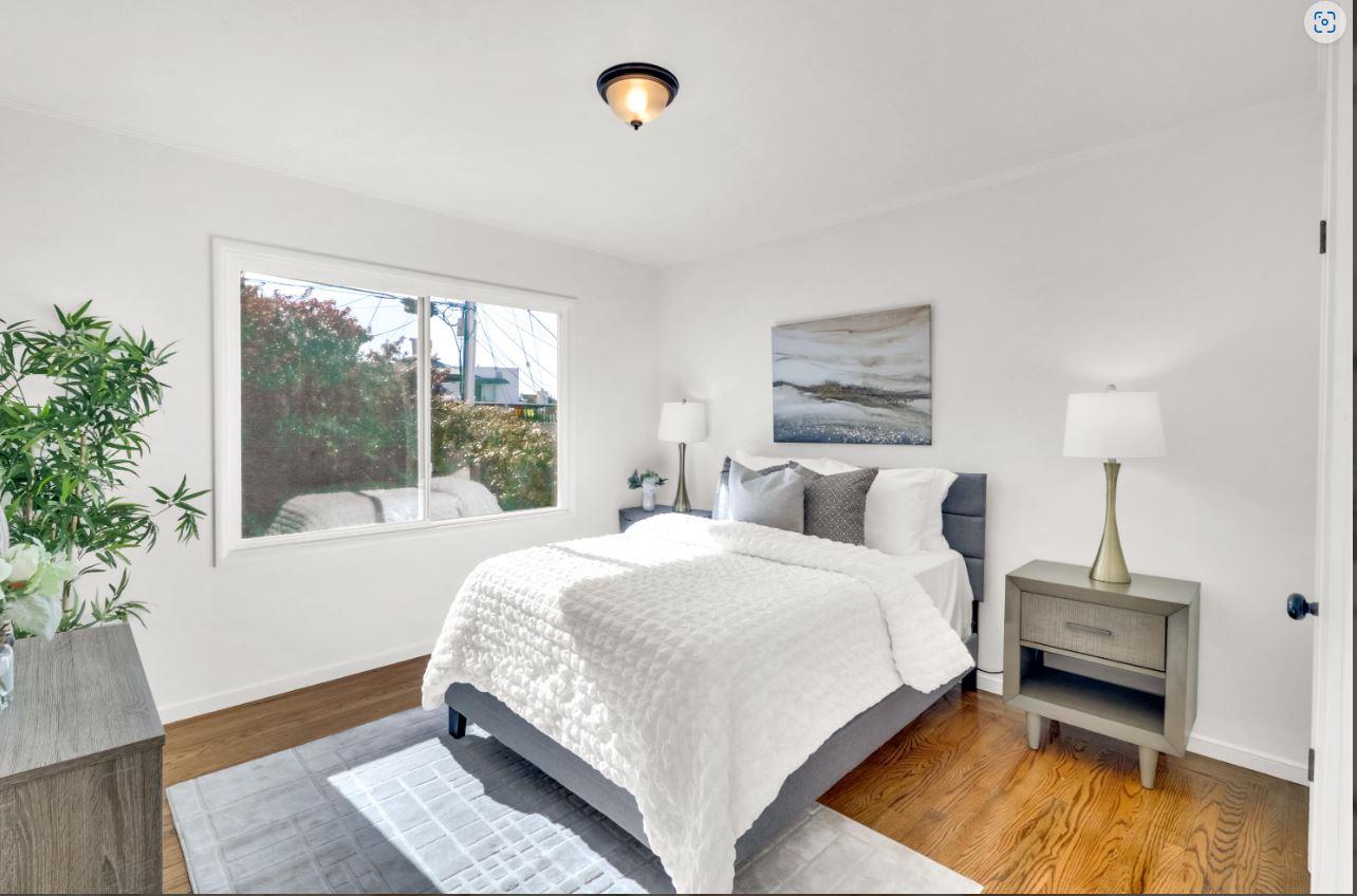 58 Pinehaven Drive Daly City, CA 94015 - Photo 23 of 38 a bedroom with a large bed and a window