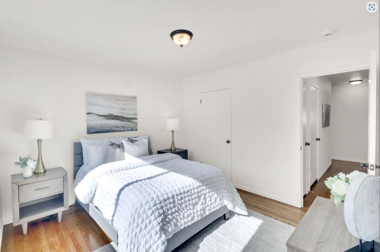 58 Pinehaven Drive Daly City, CA 94015 - Photo 24 of 38 a bedroom with a bed and wooden floor