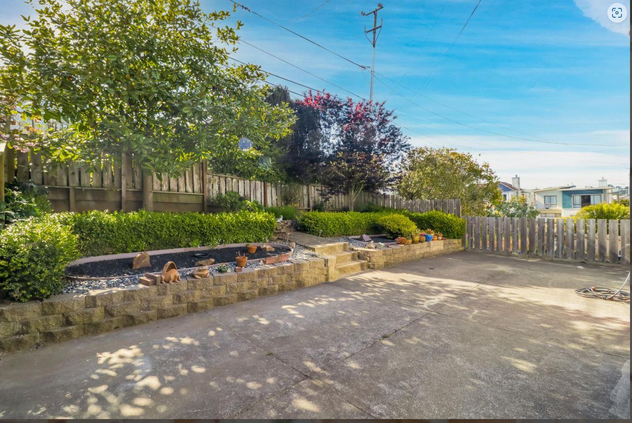 58 Pinehaven Drive Daly City, CA 94015 - Photo 36 of 38 a view of a street with a bench in front of it