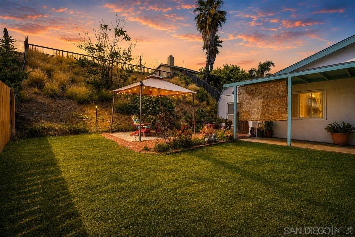 10738 2nd Street Santee, CA 92071 - Photo 38 of 52 a view of a patio with table and chairs and potted plants