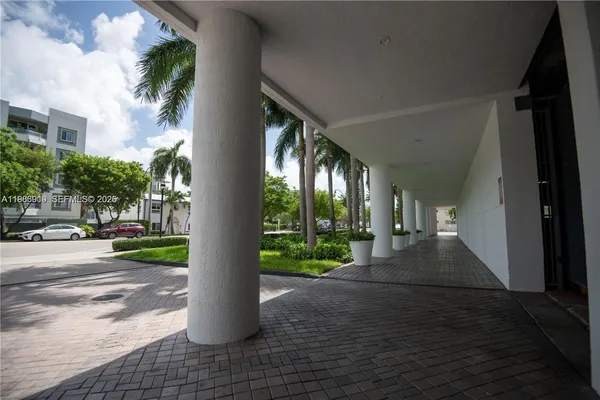 a view of path in between of building