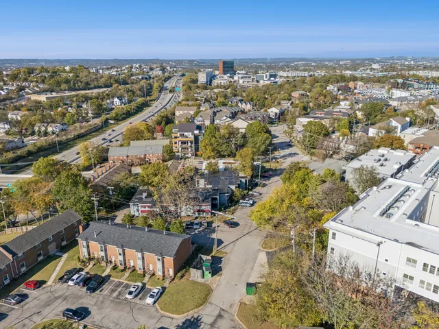 a view of a city with an ocean