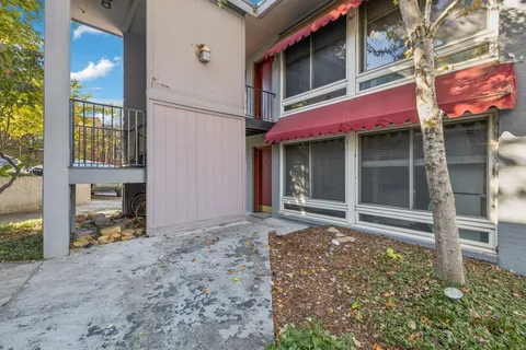 a view of a house with a door and a outdoor space
