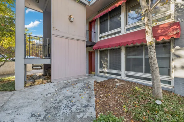 a view of a house with a door and a outdoor space