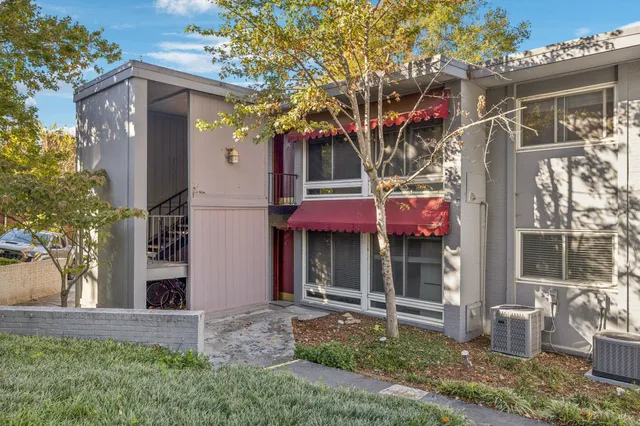 a front view of a house with a porch