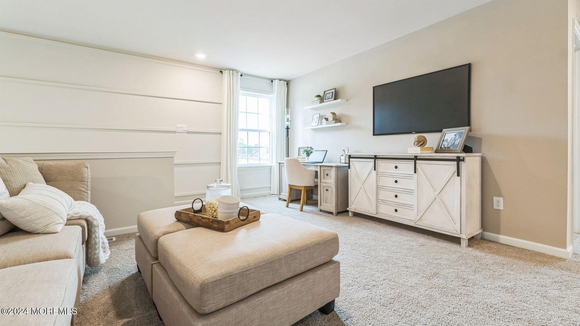 54 Victoria Gdns Square Neptune, NJ 07753 - Photo 24 of 29 a bedroom with furniture and flat screen tv