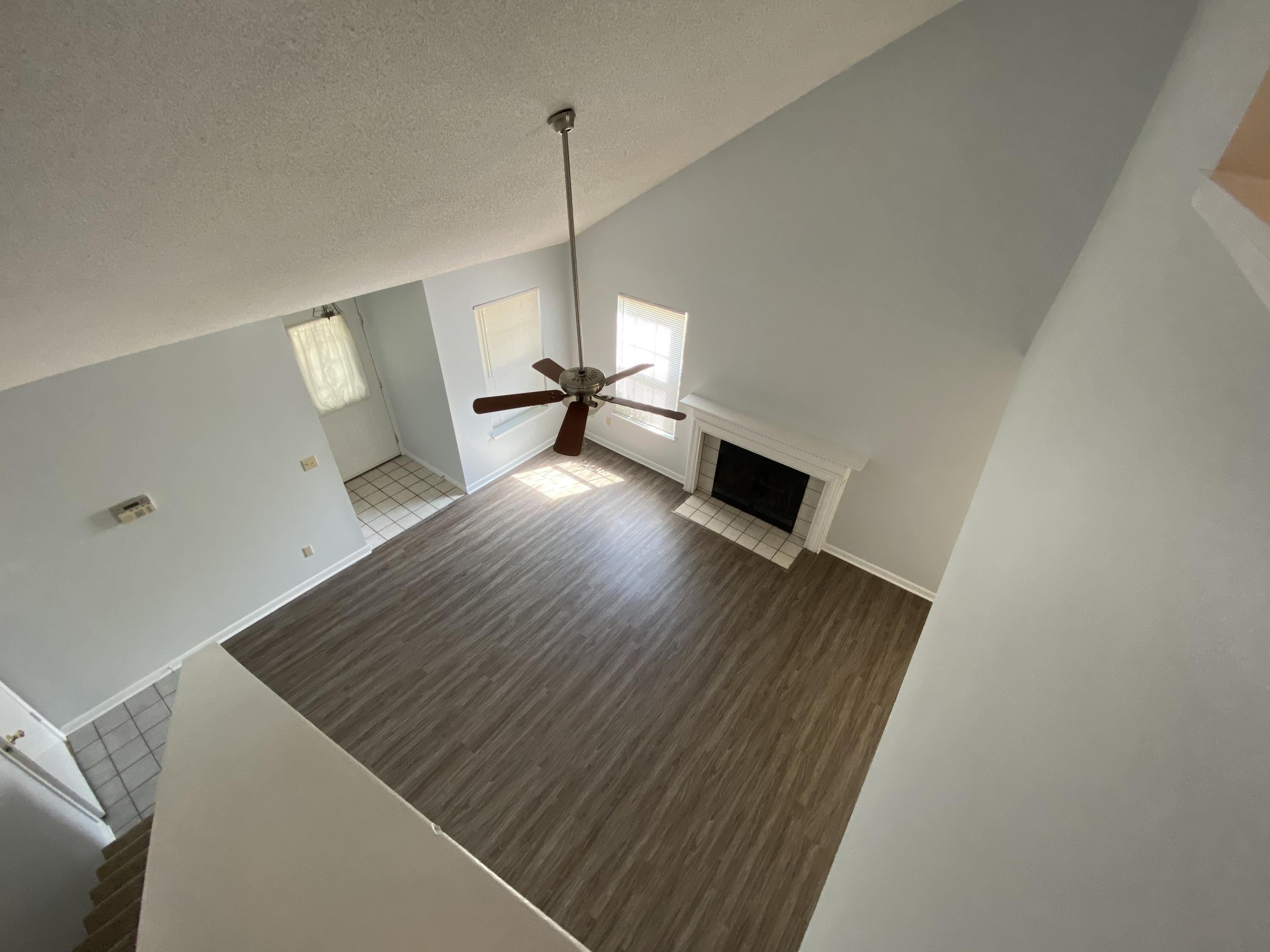 169 Wright Circle Niceville, FL 32578 - Photo 17 of 27 a view of empty room with wooden floor