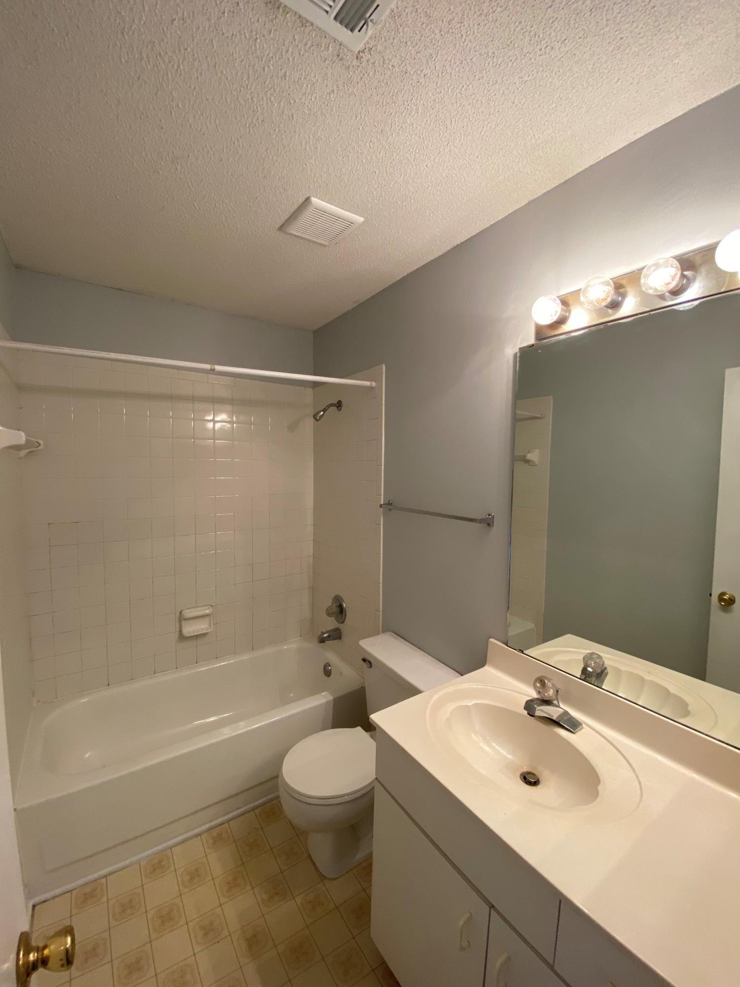 169 Wright Circle Niceville, FL 32578 - Photo 20 of 27 a bathroom with a sink a toilet and shower