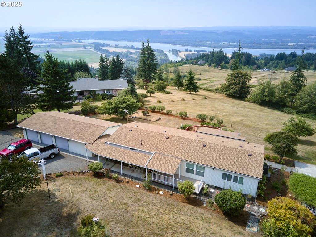 5389 Green Mountain Road Woodland, WA 98674 - Photo 1 of 47 an aerial view of a house with a garden