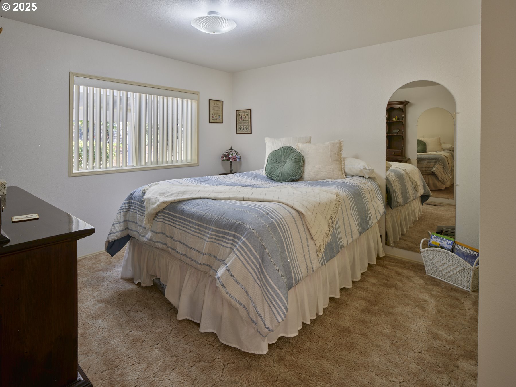 5389 Green Mountain Road Woodland, WA 98674 - Photo 13 of 47 a spacious bedroom with a bed and a window
