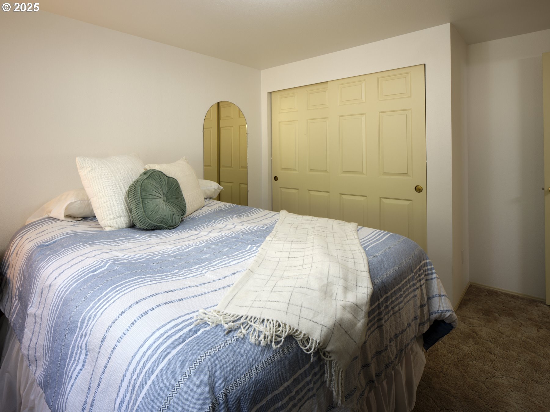 5389 Green Mountain Road Woodland, WA 98674 - Photo 14 of 47 a bedroom with a bed and a window