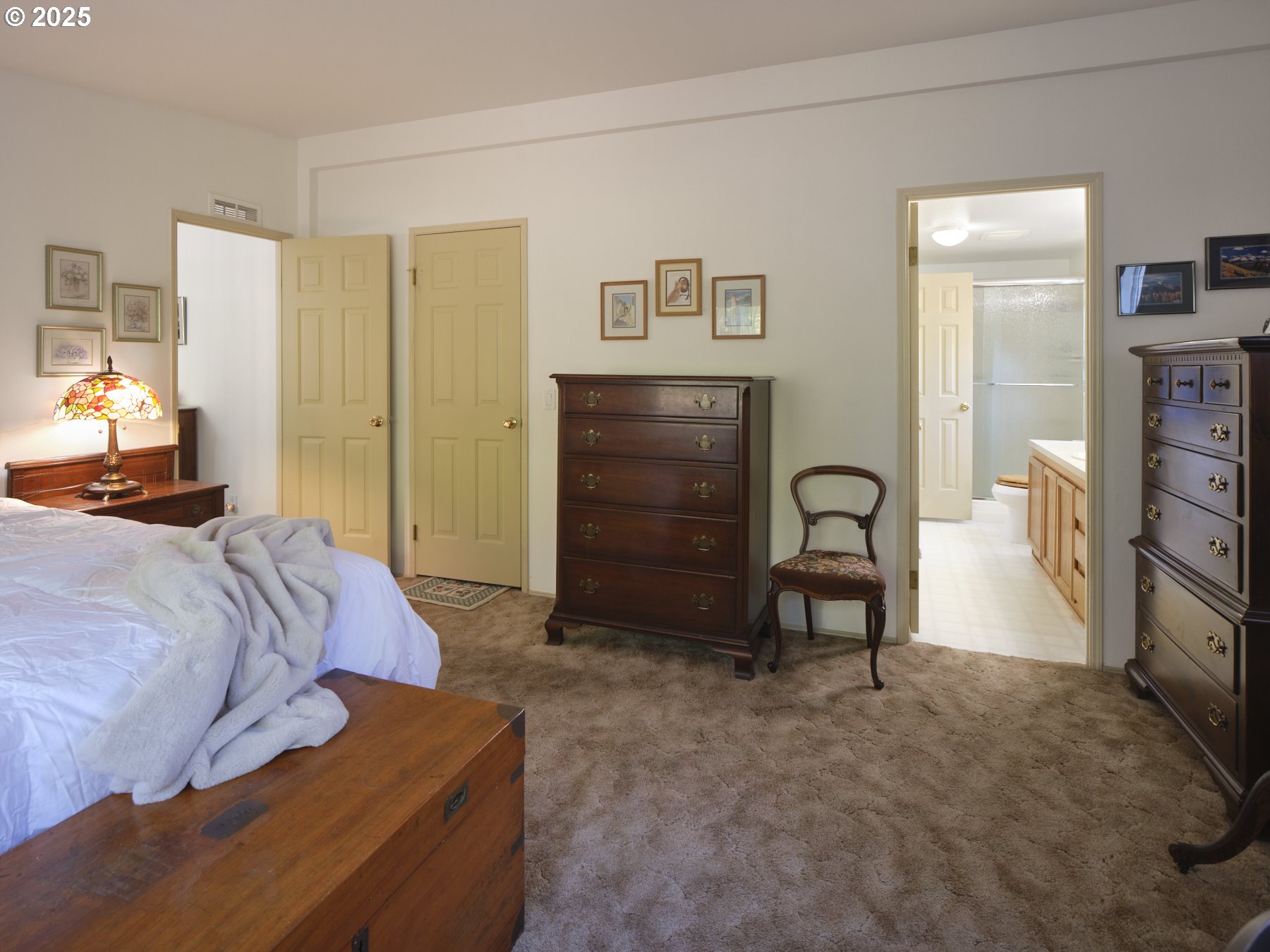 5389 Green Mountain Road Woodland, WA 98674 - Photo 27 of 47 a bedroom with a bed and furniture