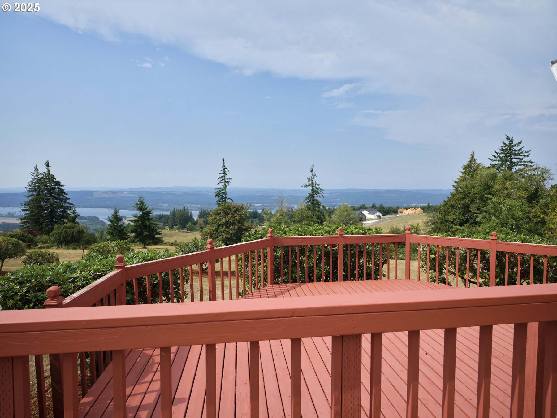 5389 Green Mountain Road Woodland, WA 98674 - Photo 33 of 47 a view of a balcony with wooden floor and fence