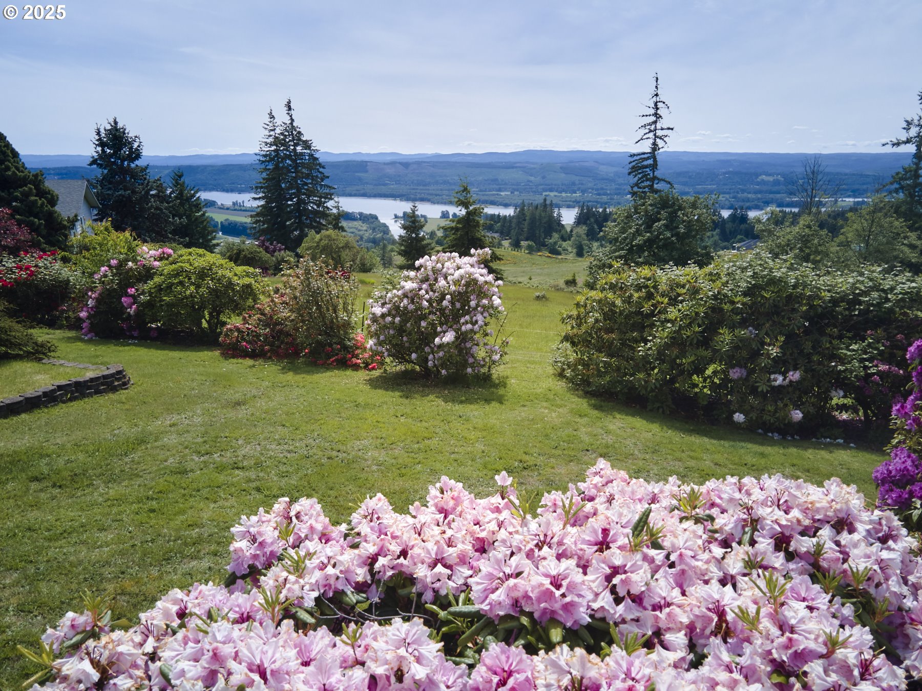 5389 Green Mountain Road Woodland, WA 98674 - Photo 35 of 47 a view of a house with a yard and garden