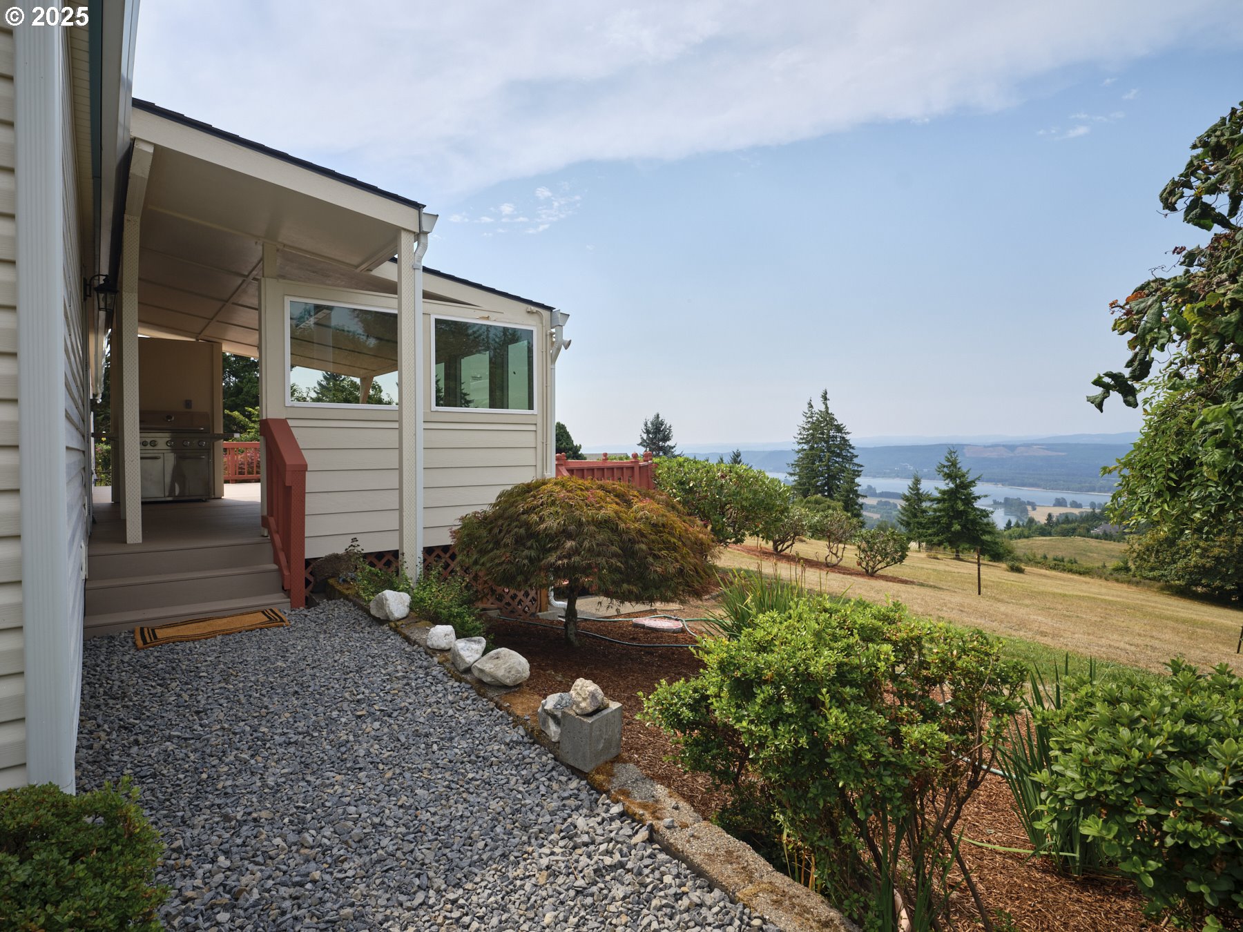 5389 Green Mountain Road Woodland, WA 98674 - Photo 37 of 47 a front view of a house with garden