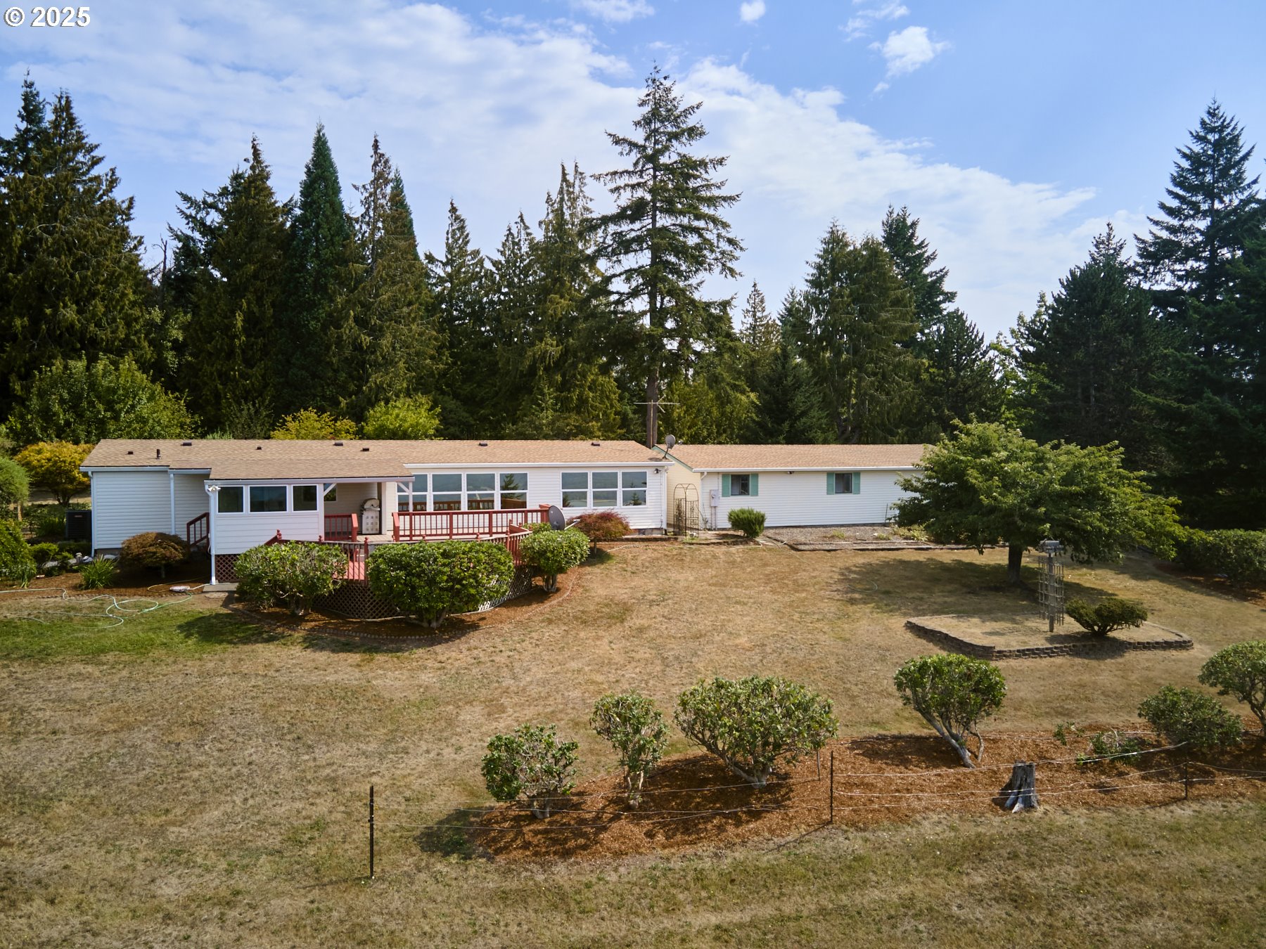5389 Green Mountain Road Woodland, WA 98674 - Photo 42 of 47 a view of a house with pool and sitting area