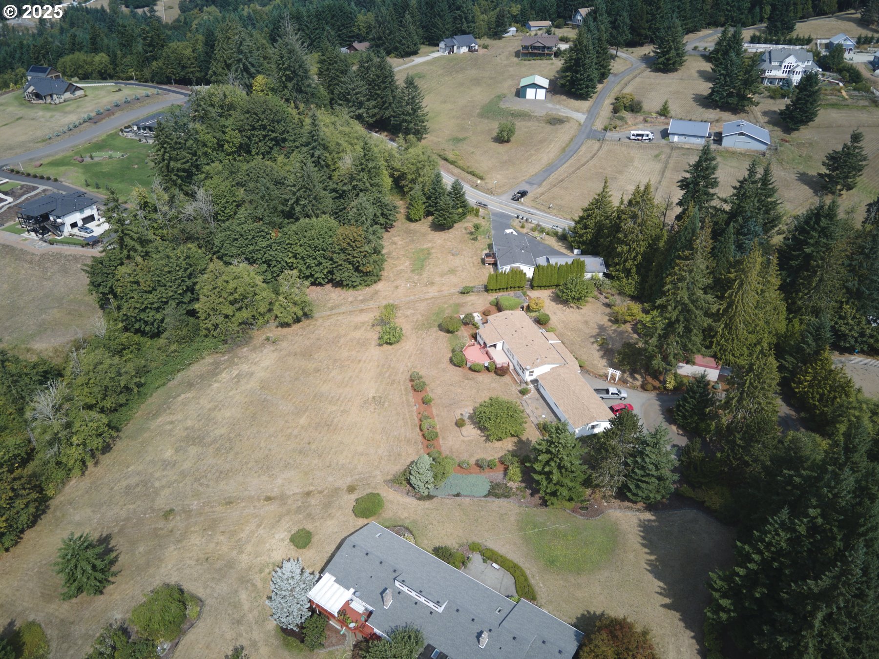 5389 Green Mountain Road Woodland, WA 98674 - Photo 43 of 47 an aerial view of a house with a lake view