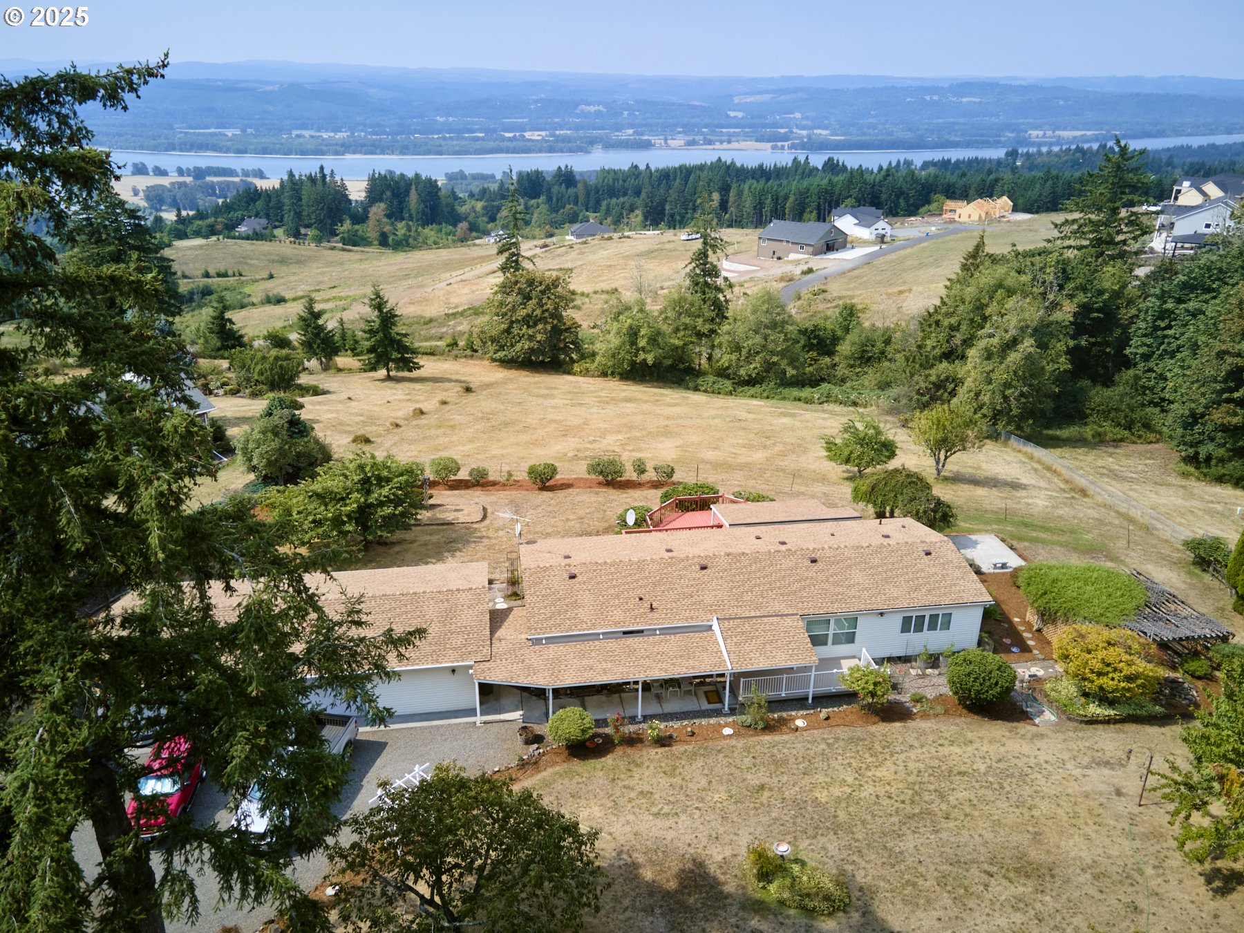 5389 Green Mountain Road Woodland, WA 98674 - Photo 44 of 47 an aerial view of a house with a lake view