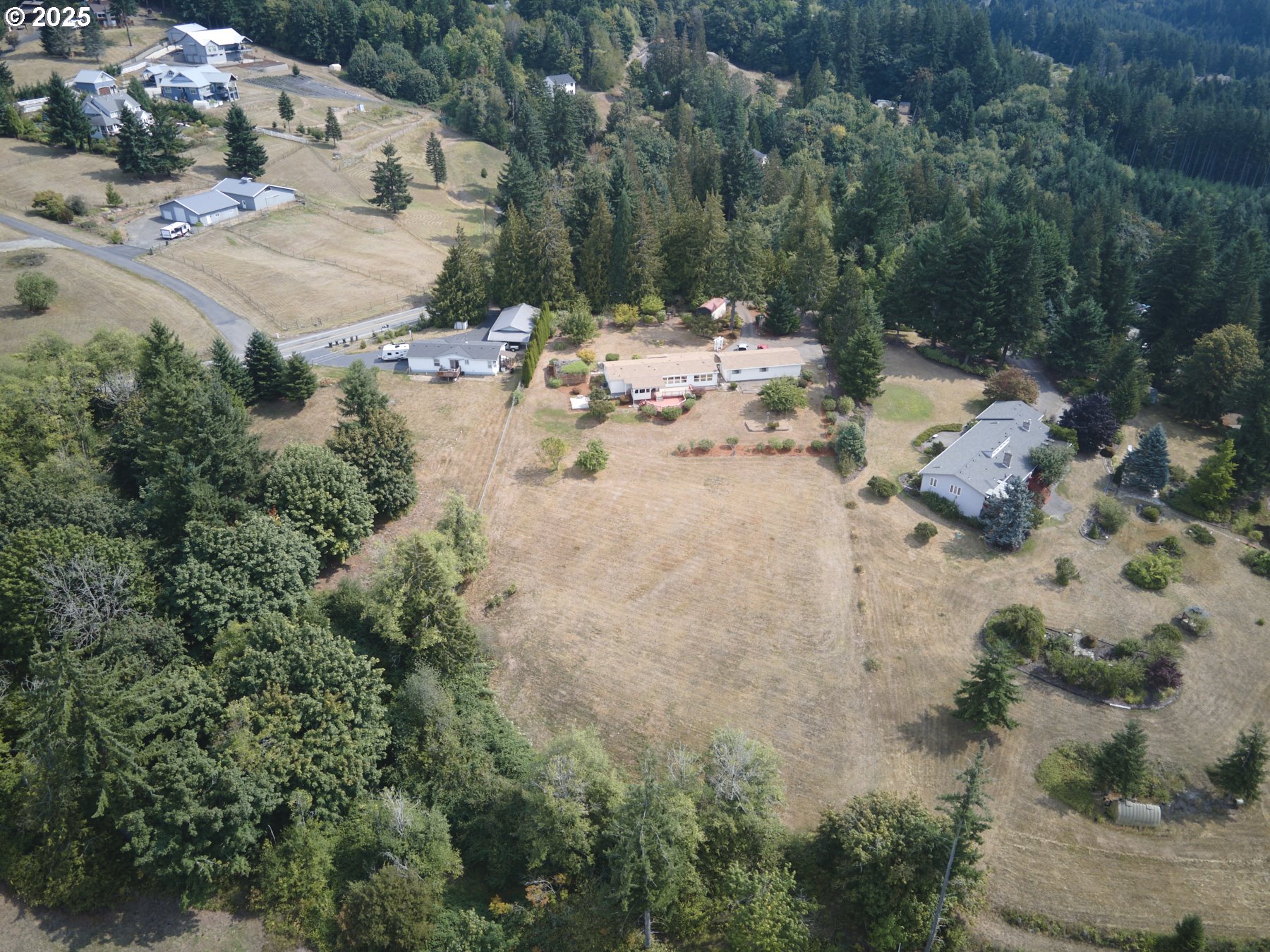 5389 Green Mountain Road Woodland, WA 98674 - Photo 46 of 47 an aerial view of a house with a yard