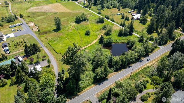 a view of a garden with swimming pool