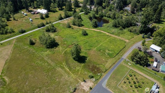 a view of a garden with an outdoor space