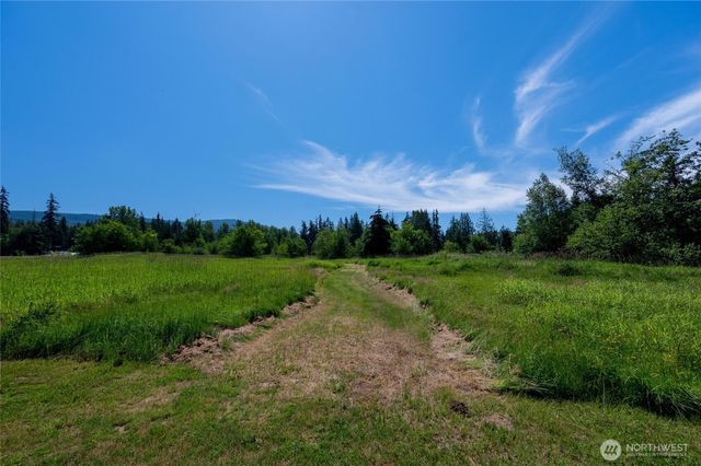 a view of building with green space