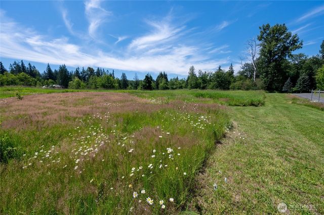a view of field with green space