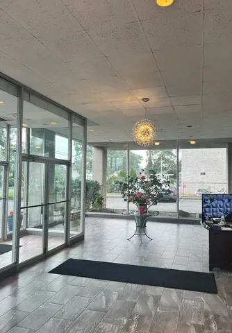 a view of a living room and window