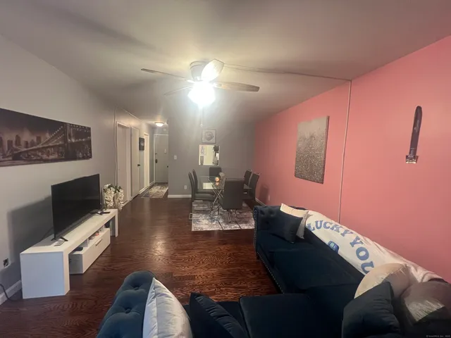 a workspace with furniture and wooden floor