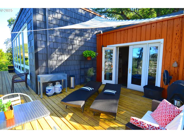 a view of a chairs and tables in the patio