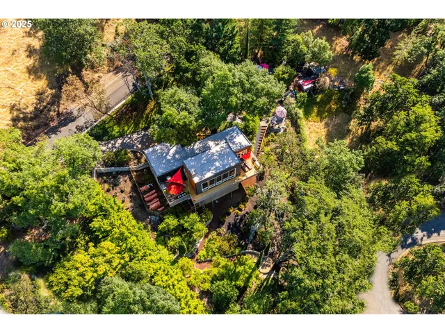 a backyard of a house with lots of green space