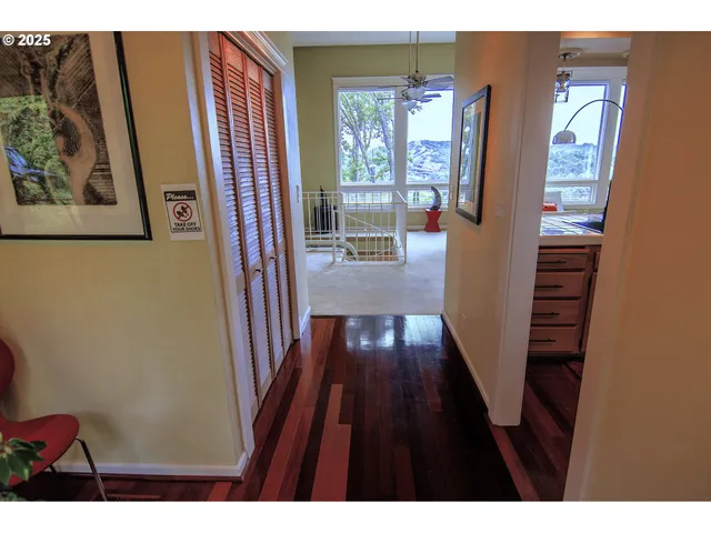 a view of entryway with wooden floor