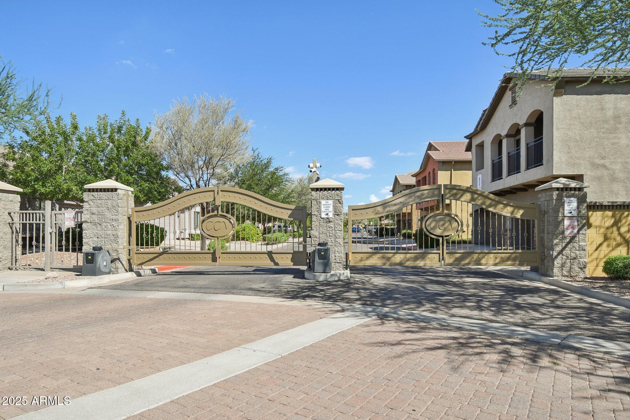 2250 East Deer Valley Drive, Unit 109 Phoenix, AZ 85024 - Photo 12 of 20 a view of a street with houses