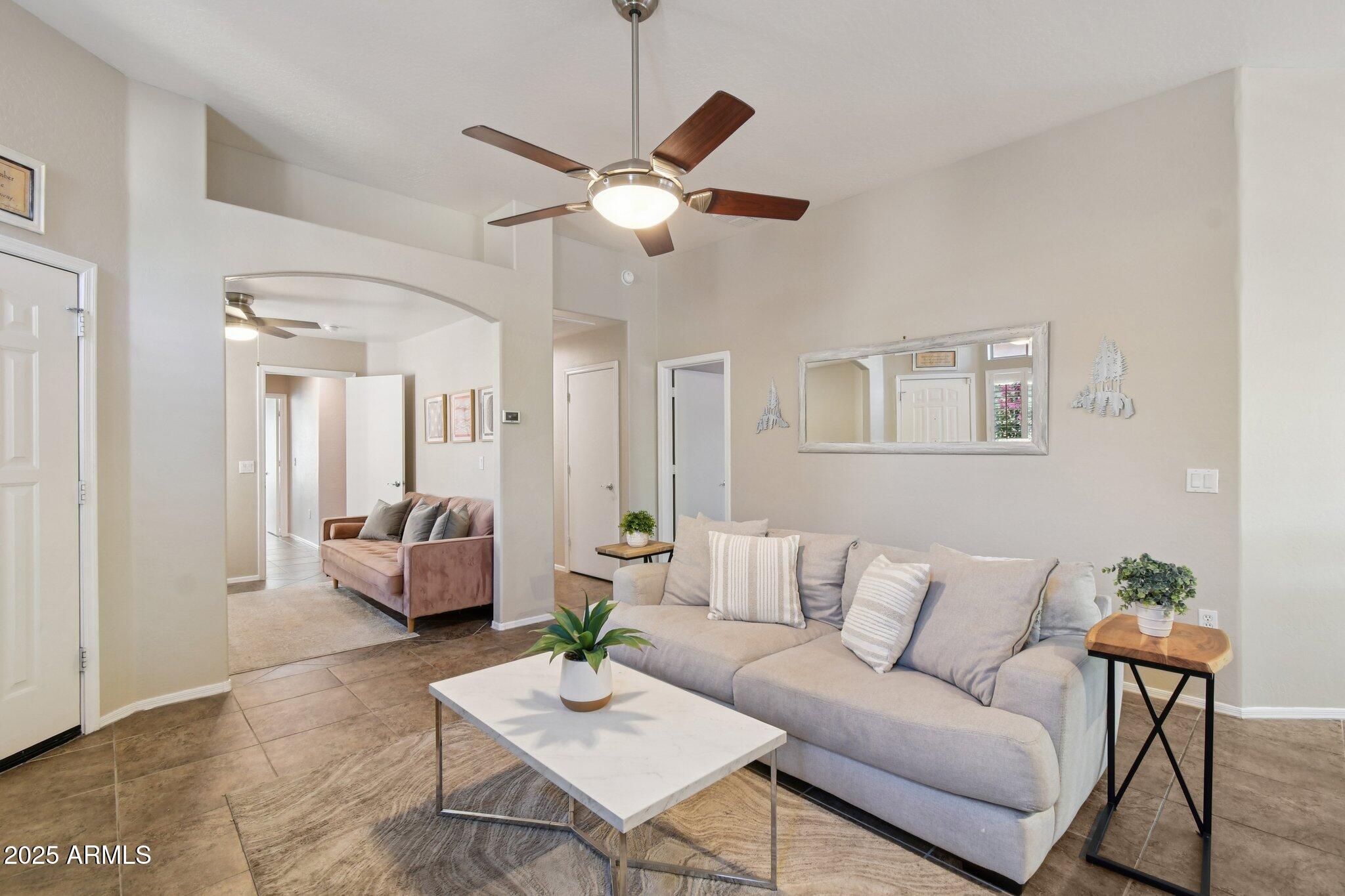 2250 East Deer Valley Drive, Unit 109 Phoenix, AZ 85024 - Photo 5 of 20 a living room with furniture