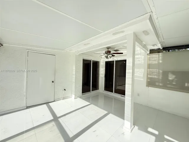 a backyard of a house with seating space