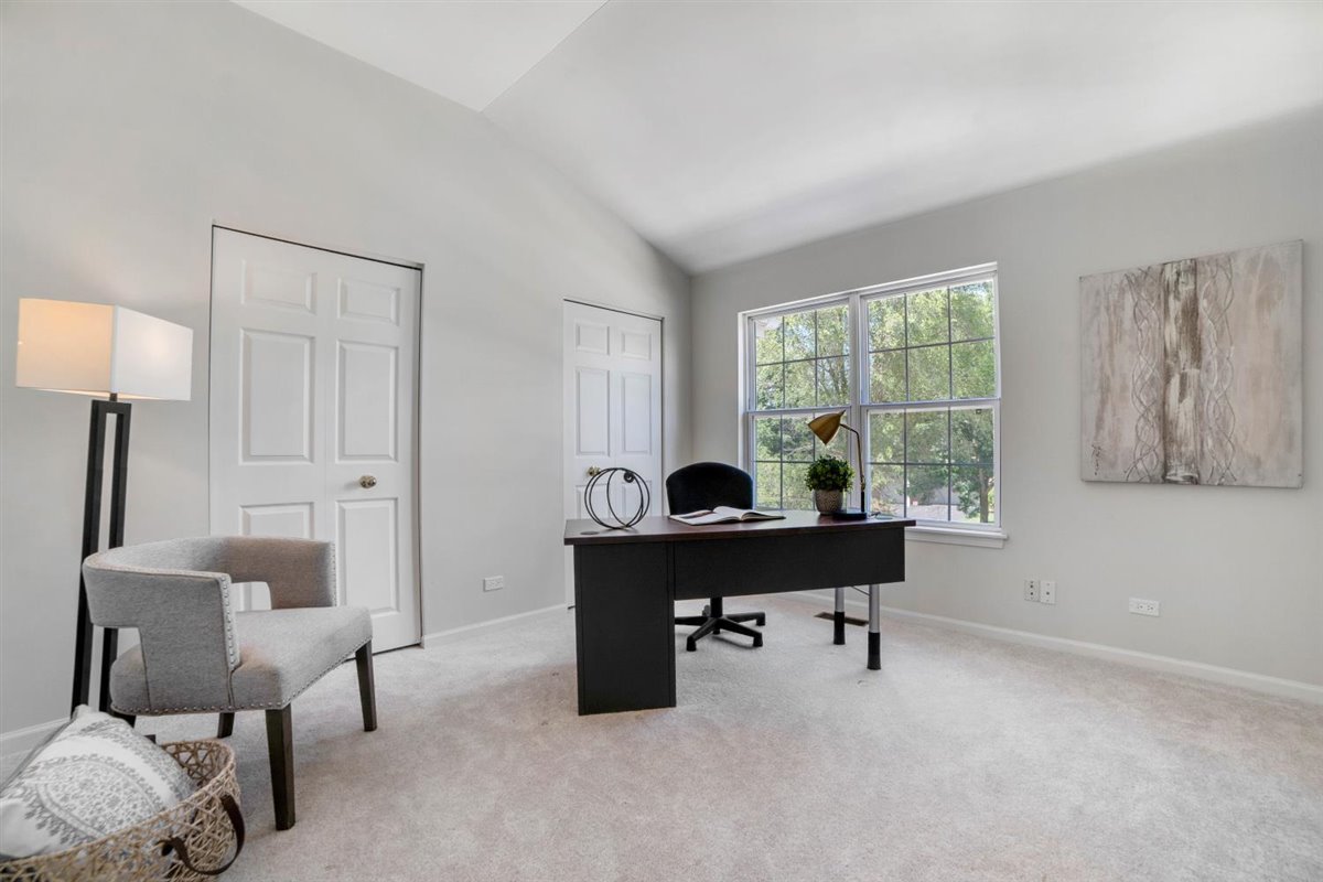 752 Sigmund Road Naperville, IL 60563 - Photo 27 of 55 a view of a workspace with furniture and a window