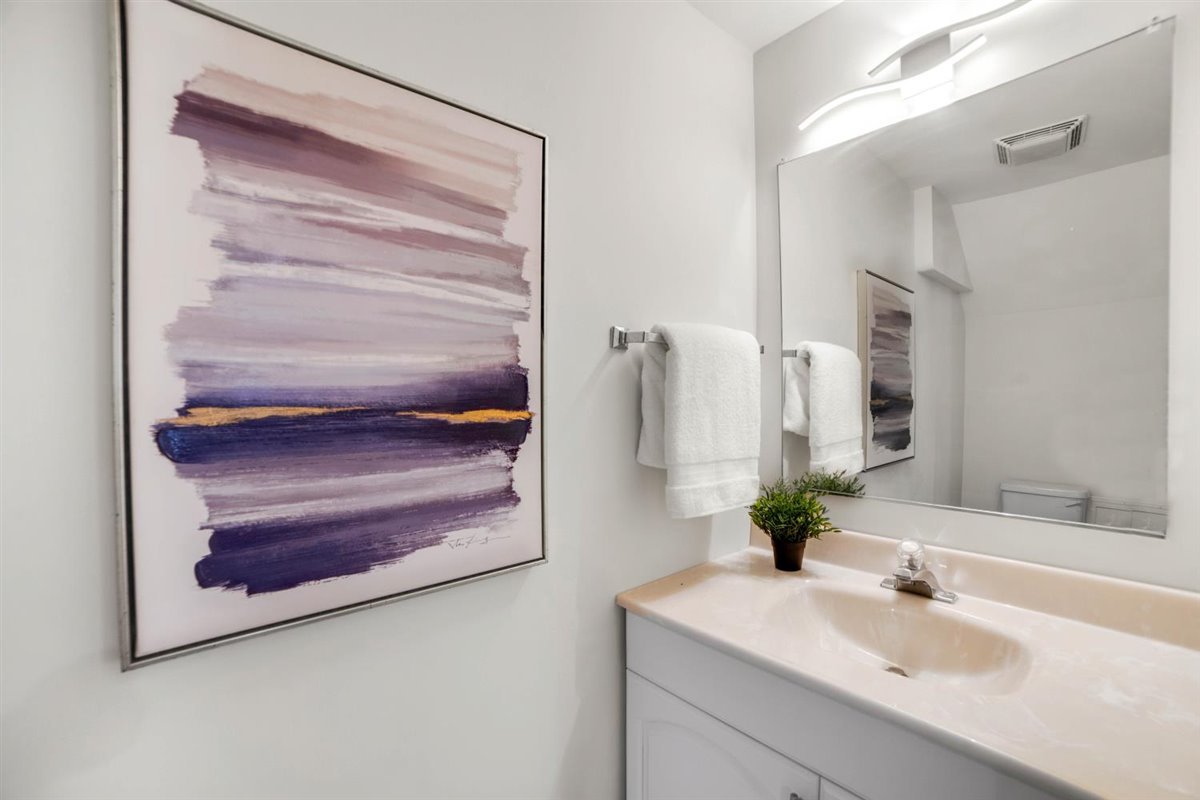 752 Sigmund Road Naperville, IL 60563 - Photo 36 of 55 a bathroom with a sink and a mirror