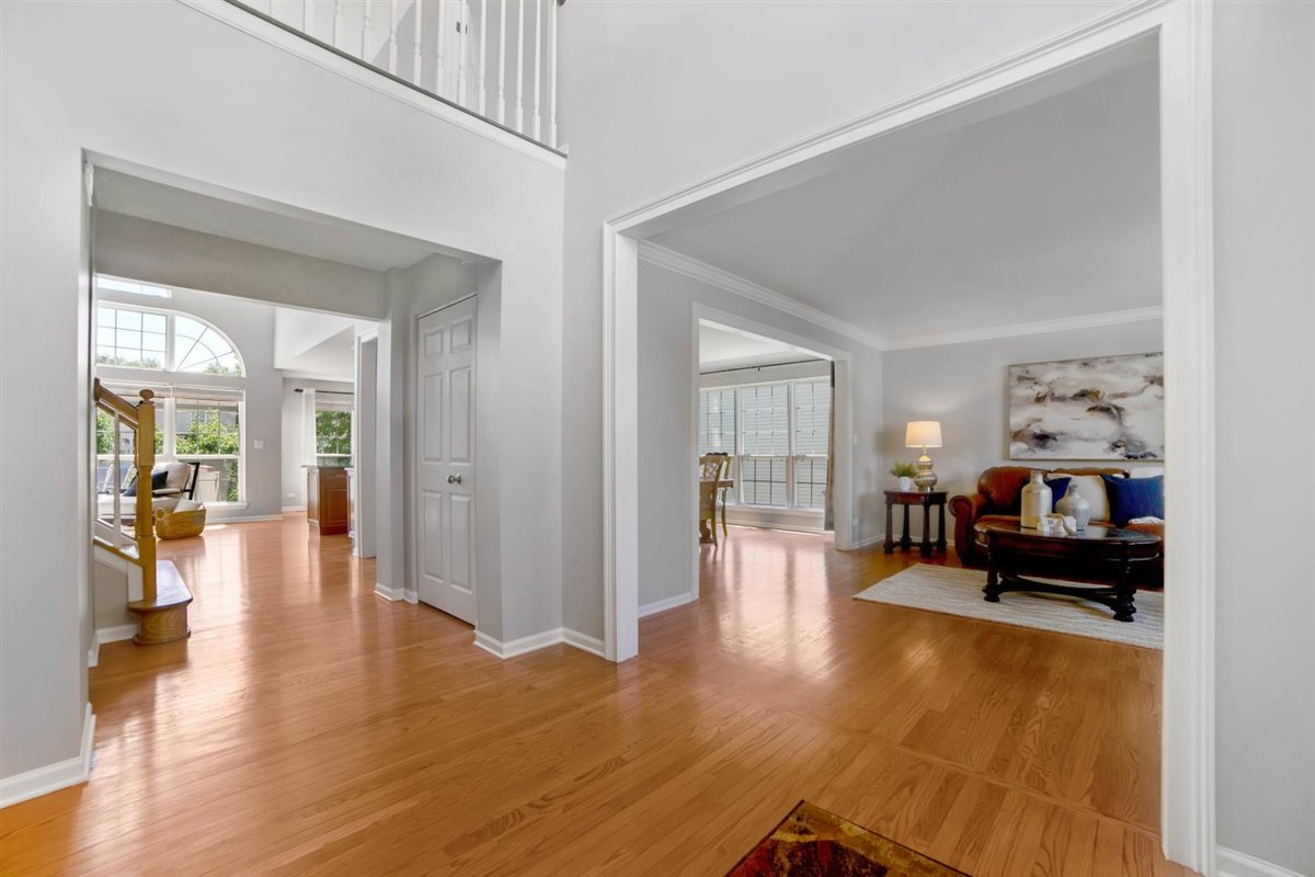 752 Sigmund Road Naperville, IL 60563 - Photo 4 of 55 a living room with furniture and wooden floor