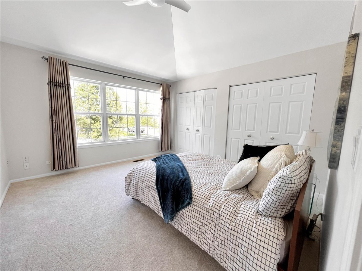 752 Sigmund Road Naperville, IL 60563 - Photo 47 of 55 a bedroom with a bed and a window