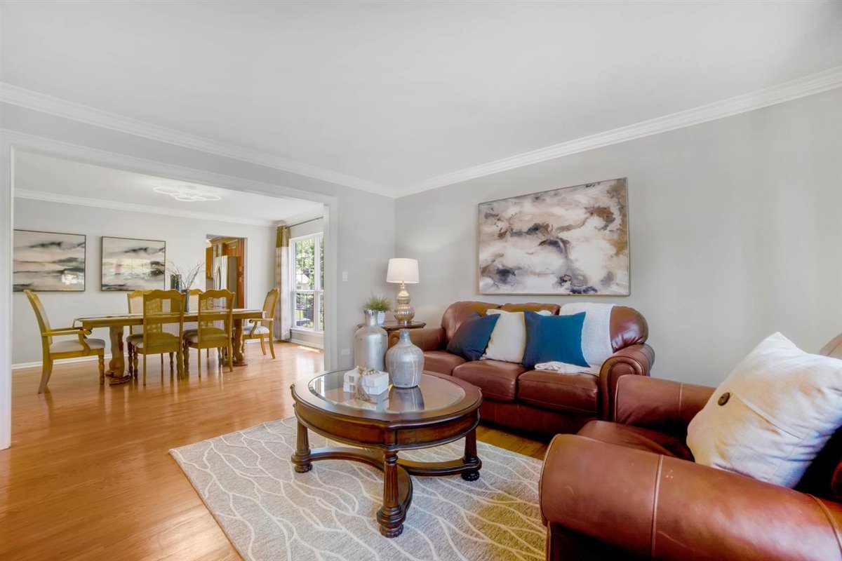 752 Sigmund Road Naperville, IL 60563 - Photo 5 of 55 a living room with furniture and wooden floor