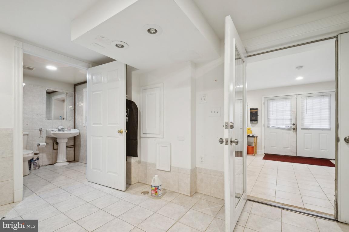 2025 Fairland Road Silver Spring, MD 20904 - Photo 12 of 23 a view of a bathroom with a shower